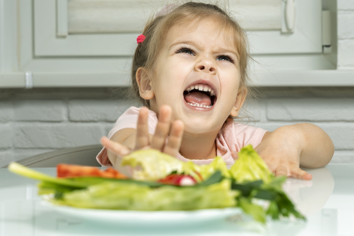 Girl_refuses_to_eat_vegetables
